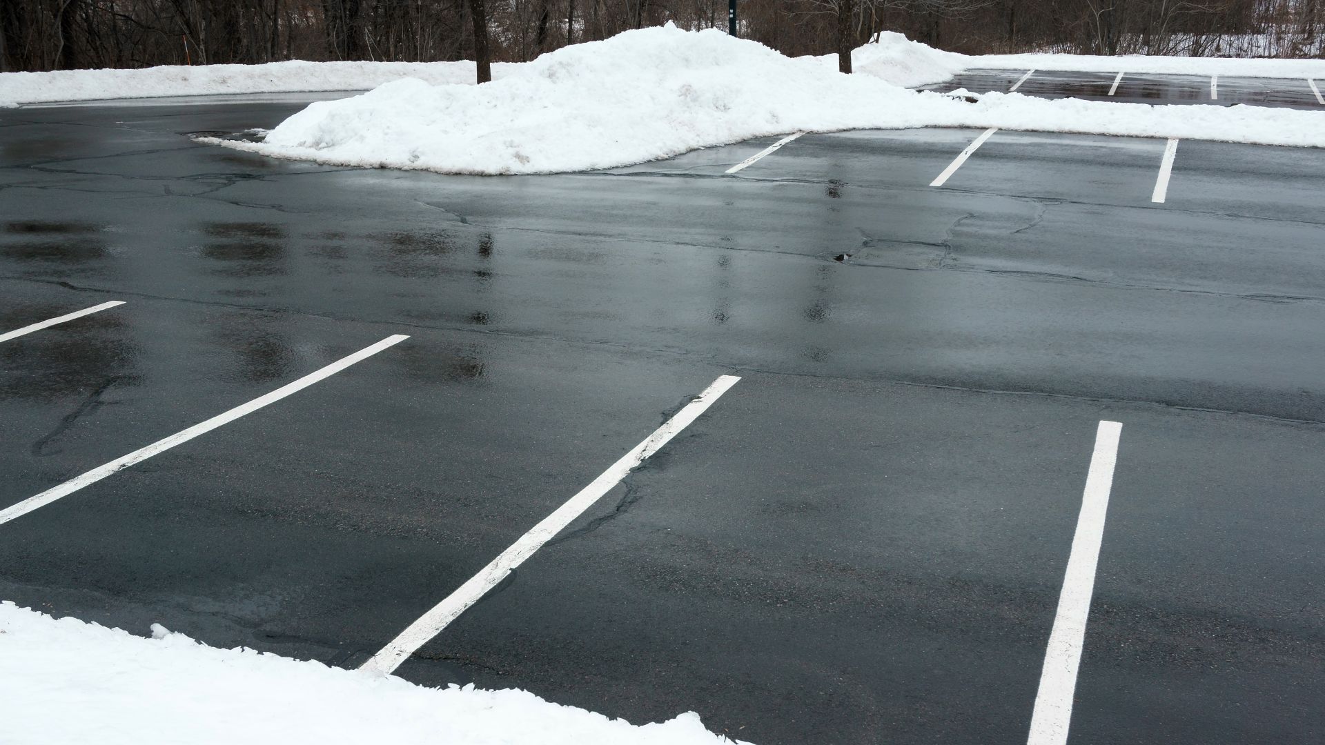 Commercial parking lot cleared from snow by snow removal services in Nazareth, PA.