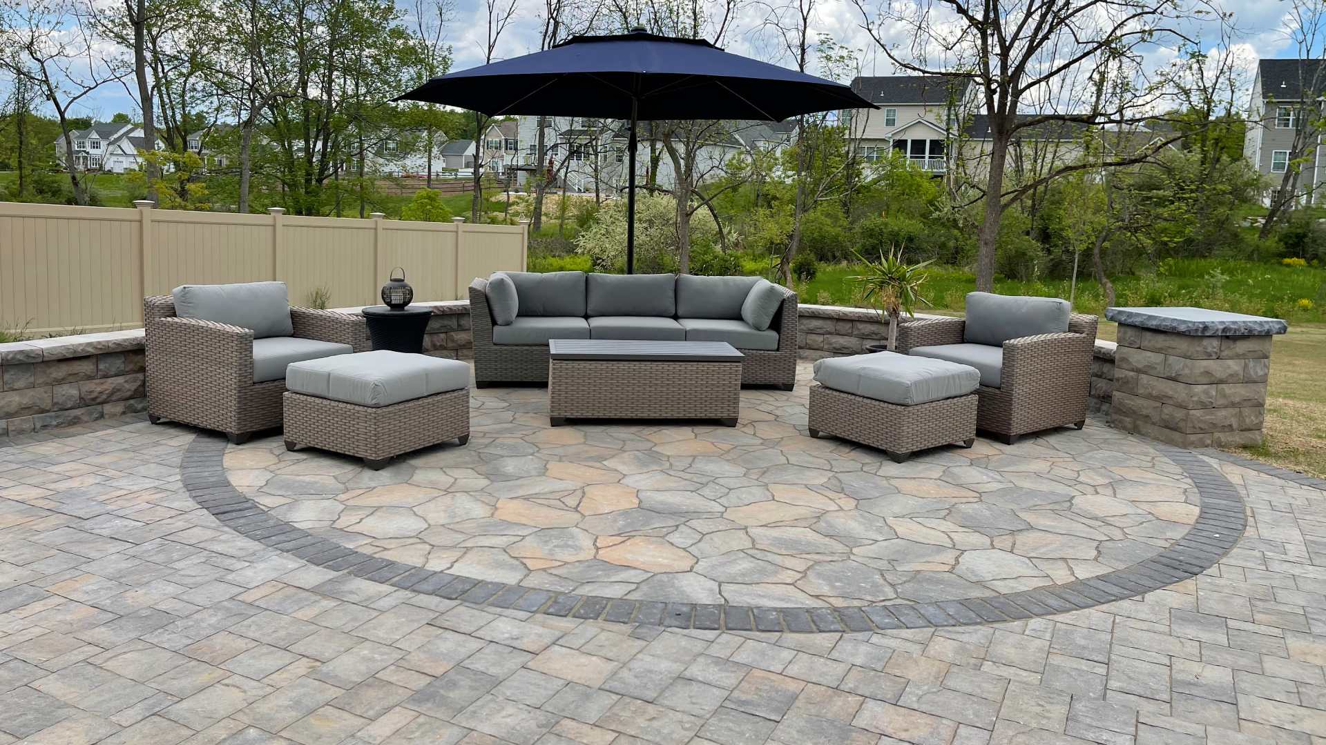 Custom stone patio built with seating wall in Clinton, NJ.