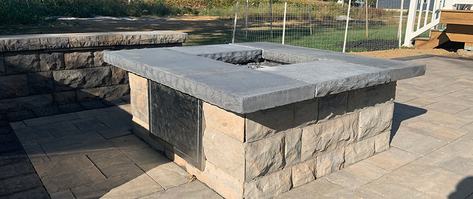 Fire pit installed over patio in Phillipsburg, NJ.