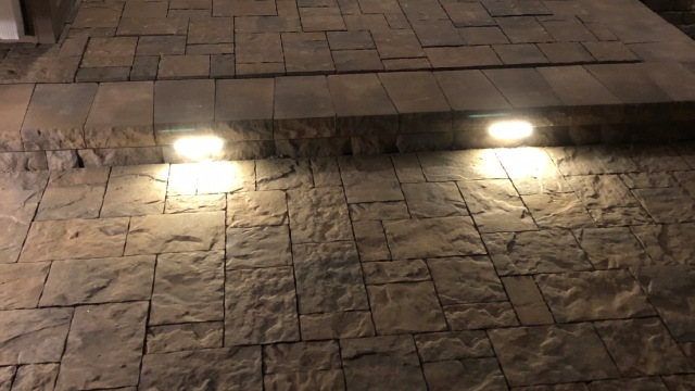 Landscape lighting installed for front porch steps in Easton, PA.