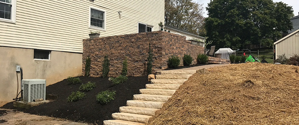 Outdoor steps and mulching added to a landscape in Warren County, NJ.