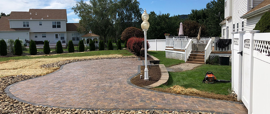 Patio with edged standing out installed in Oxford, NJ.