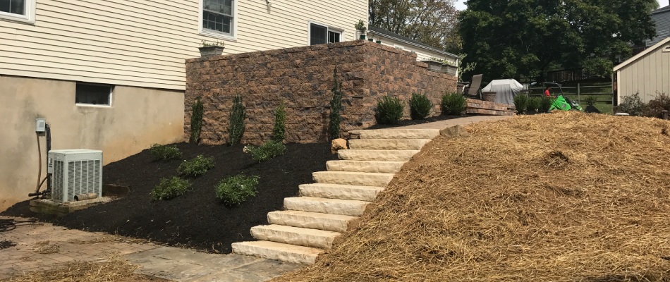 Custom build retaining wall for patio and outdoor steps in Bethlehem, PA.
