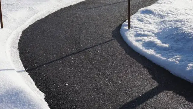 Commercial property's sidewalk clear from snow removal services in Easton, PA.