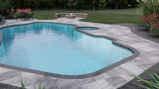 Beautiful swimming pool, patio, and fire pit design for a home in Nazareth, PA.