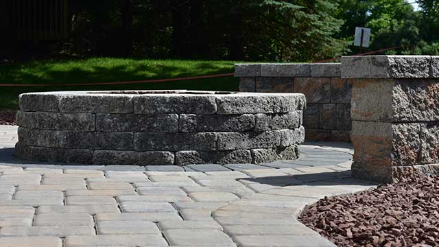 Fire pit and custom paver patio installed at a home in Easton, PA.